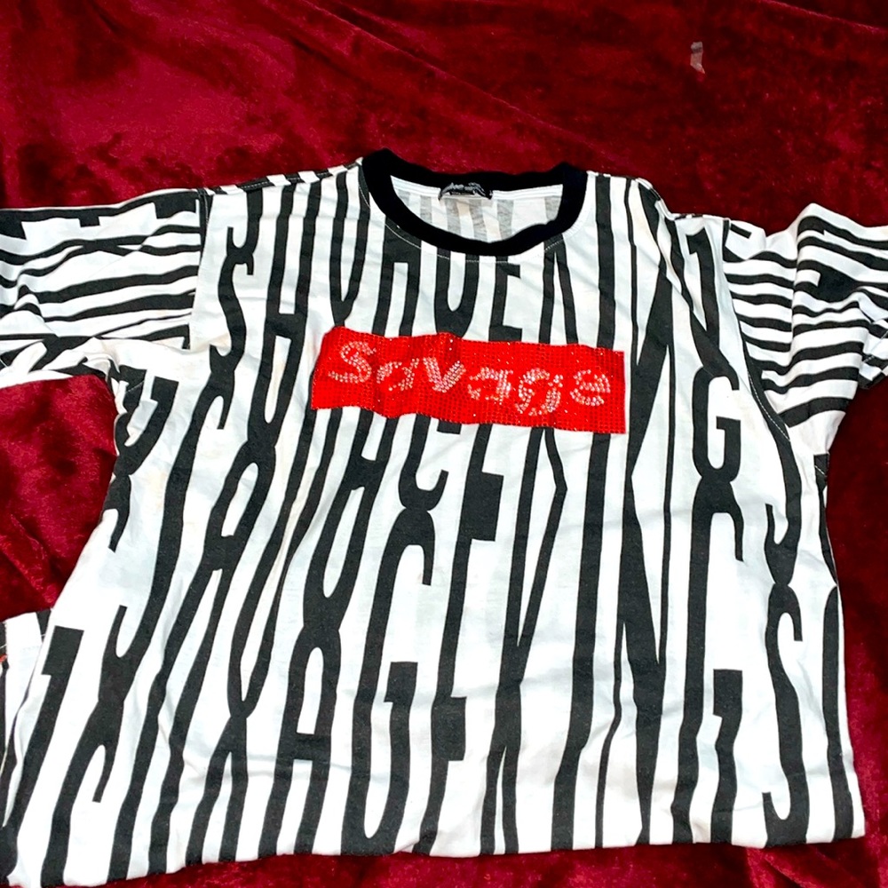 Black white design with red savage design size is a M brand new never bin were